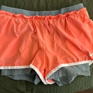 Nike Dri-Fit shorts, size small. More like a coral color with gray spandex